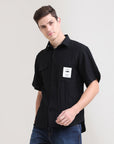 Night Shadow: Solid Black Oversized Half Sleeve Double Pocket Shirt