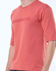 Peach Knitted Solid T-Shirt